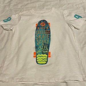 Boys OshKosh T-Shirt white with print on the front ant on both sleeves.